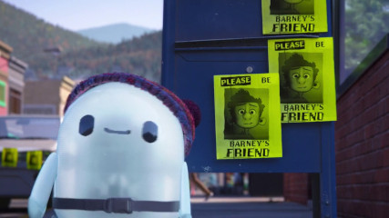 Ron in front of a postbox covered with posters that say: Please be Barney’s friend